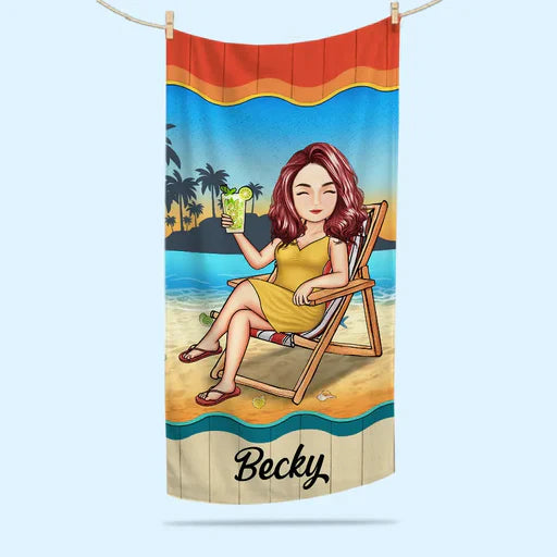 Personalized towel gifts beach towel with a custom cartoon woman relaxing on a beach chair holding a drink