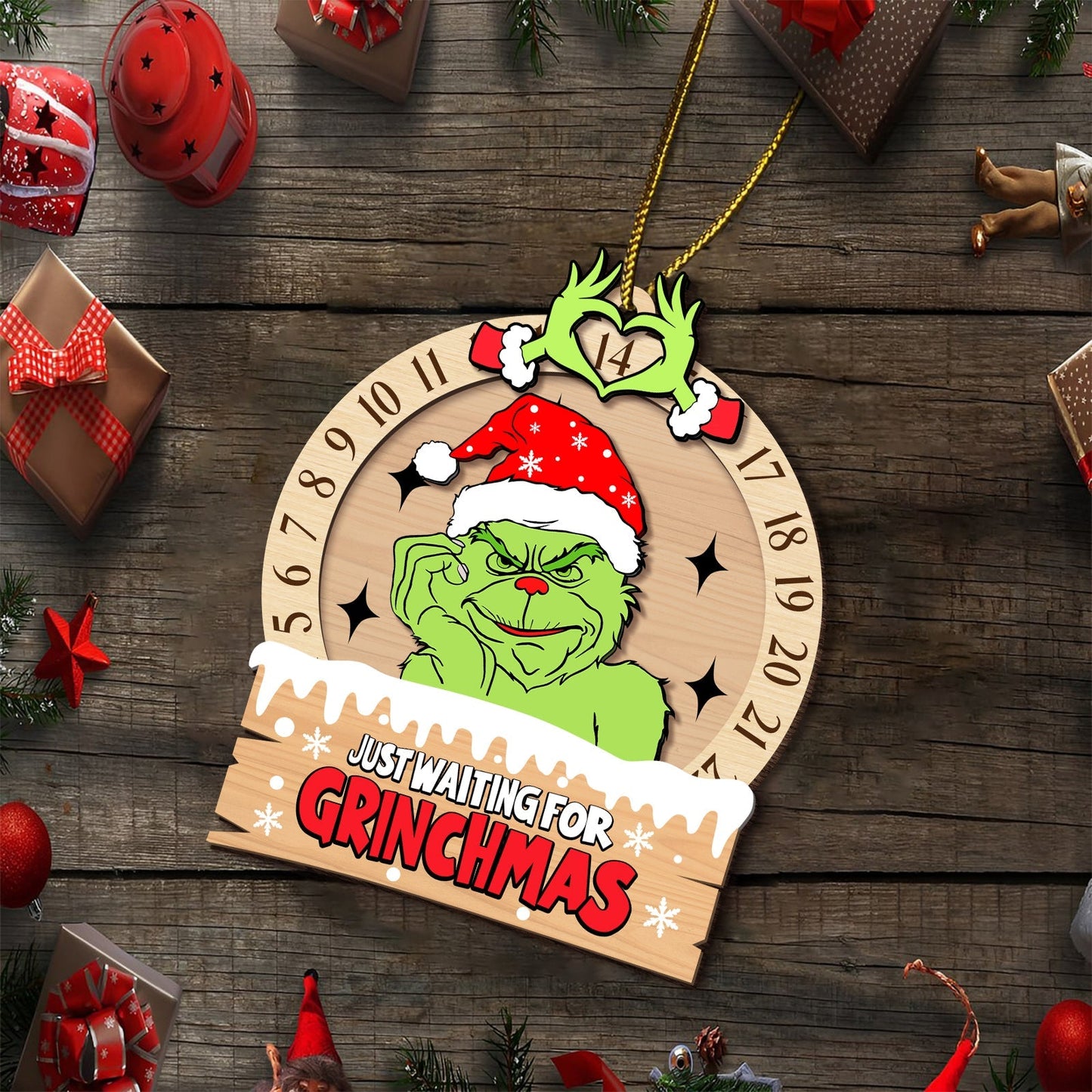 3-layered Grinch ornament for Christmas with countdown calendar and festive Santa hat design
