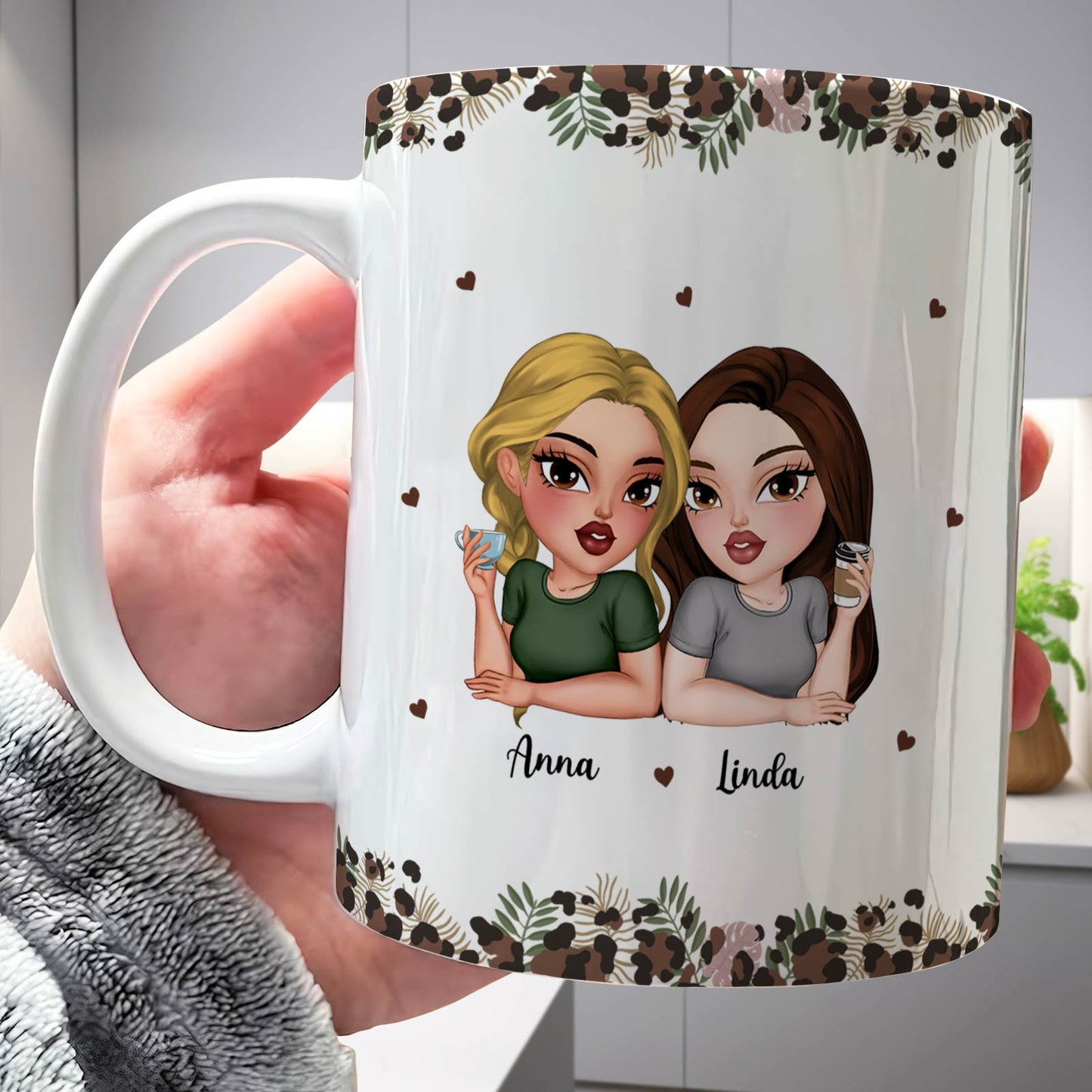 Personalized white mug with cartoon portraits of two women named Anna and Linda floral border custom bestie coffee cup gift