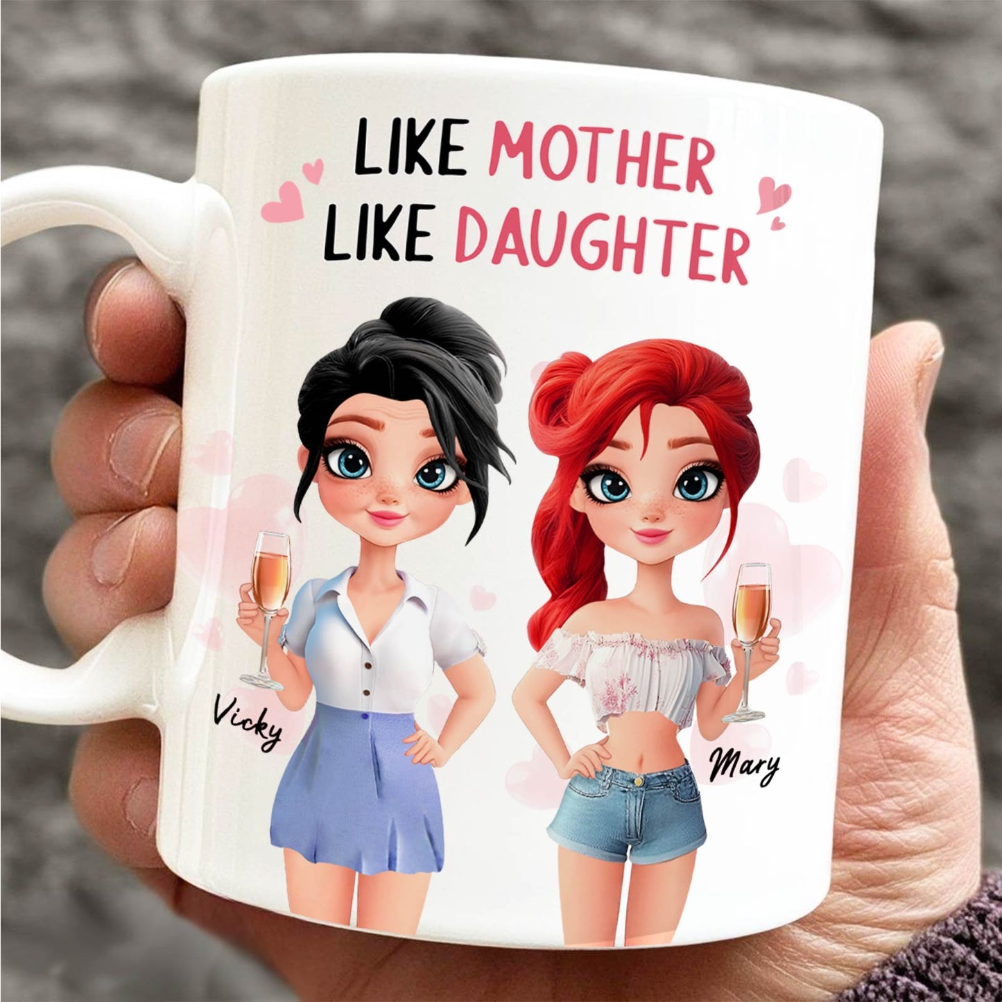 White ceramic custom like mother like daughter mug showing cartoon mother Vicky and daughter Mary holding drinks