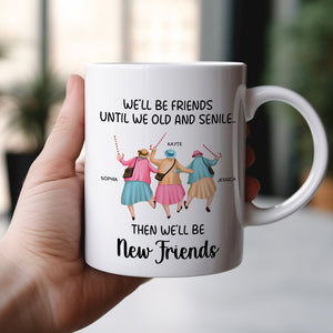 White ceramic personalized best friends mug with three women in colorful dresses holding hands with printed names and quote