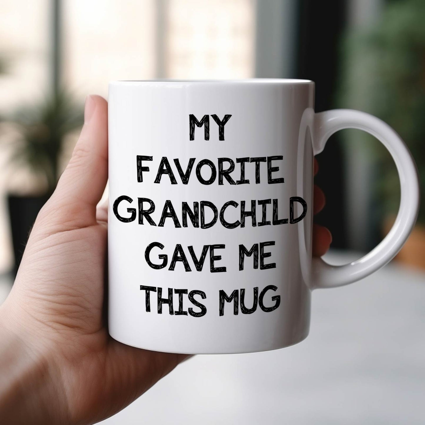 White ceramic mug reading My Favorite Grandchild Gave Me This Mug ideal unique custom mug for grandparents