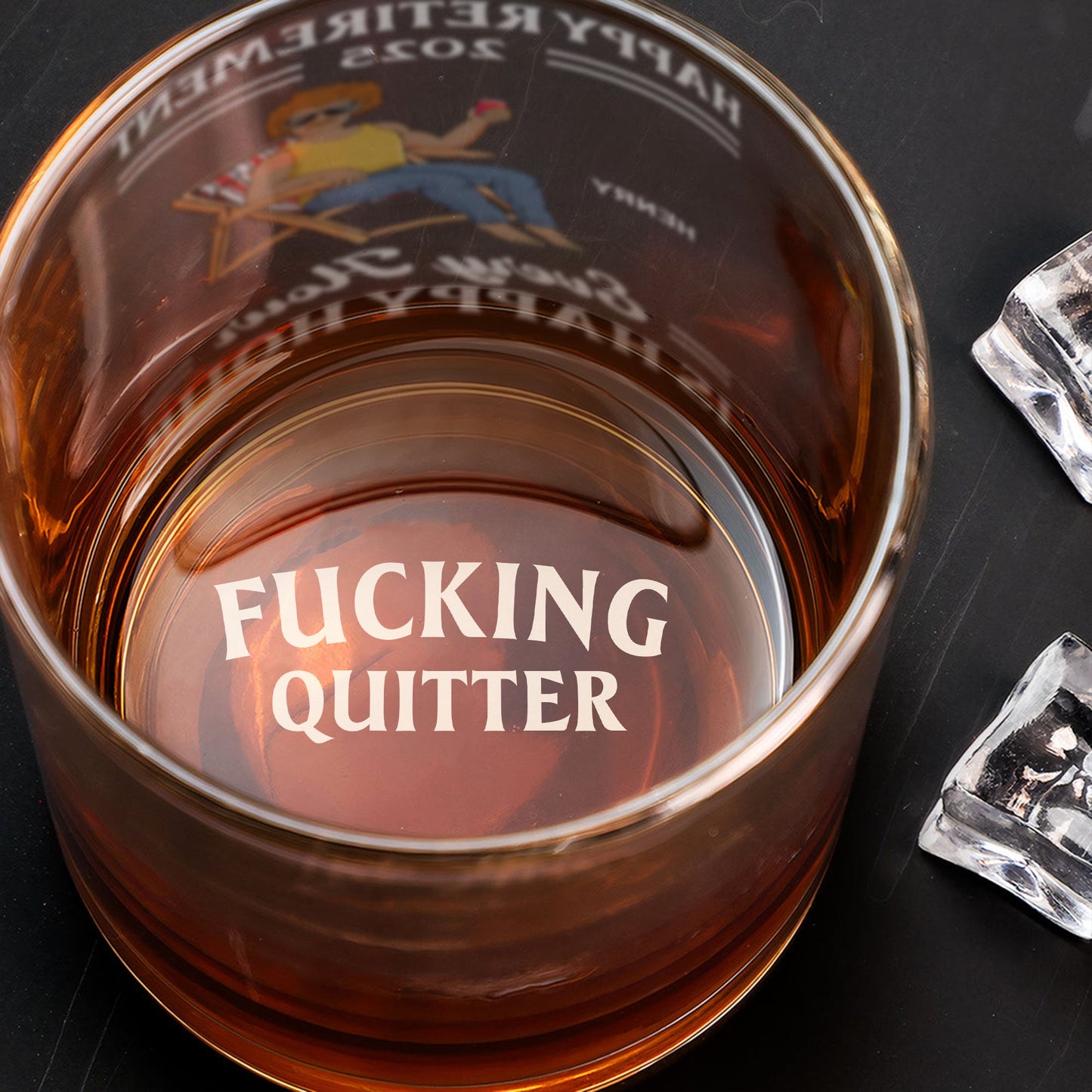 365Gifty Personalized Whiskey Glass etched with FUCKING QUITTER inside amber whiskey and ice cubes