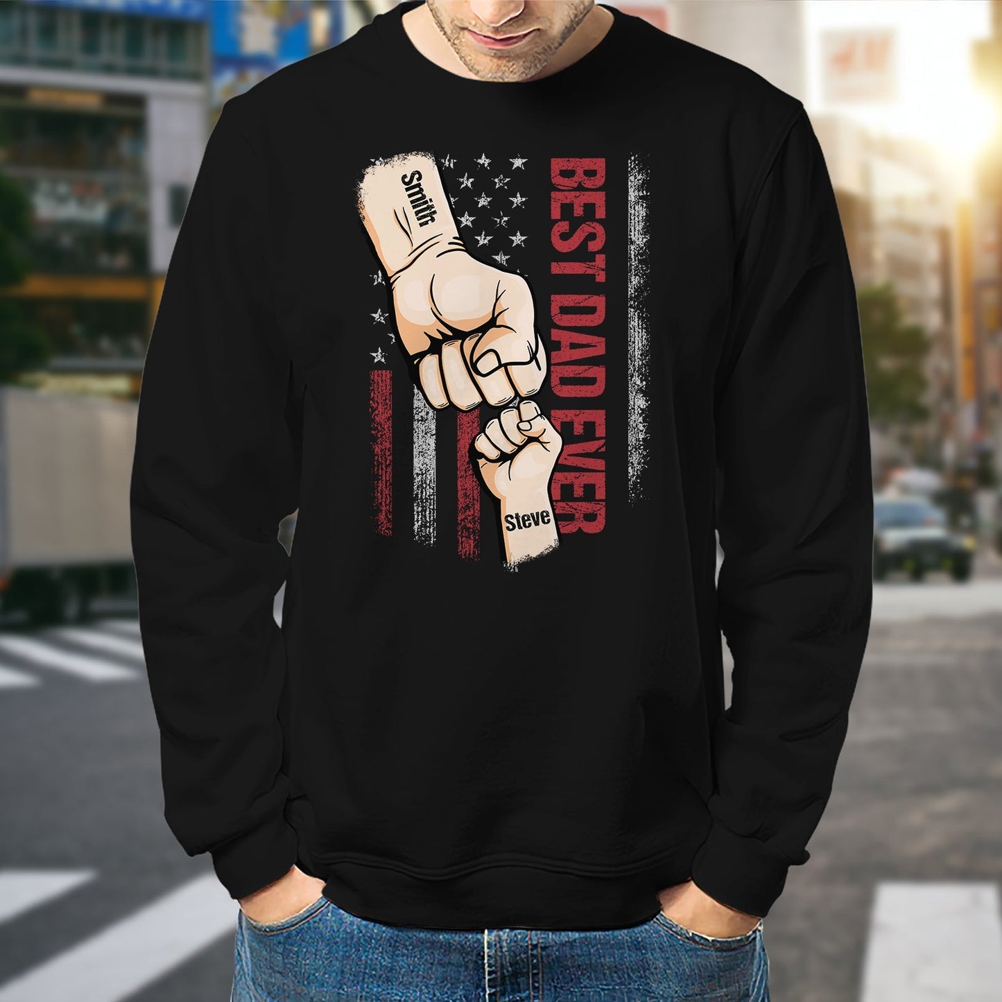 Black sweatshirt featuring best dad ever custom t-shirt design with fist bump and American flag