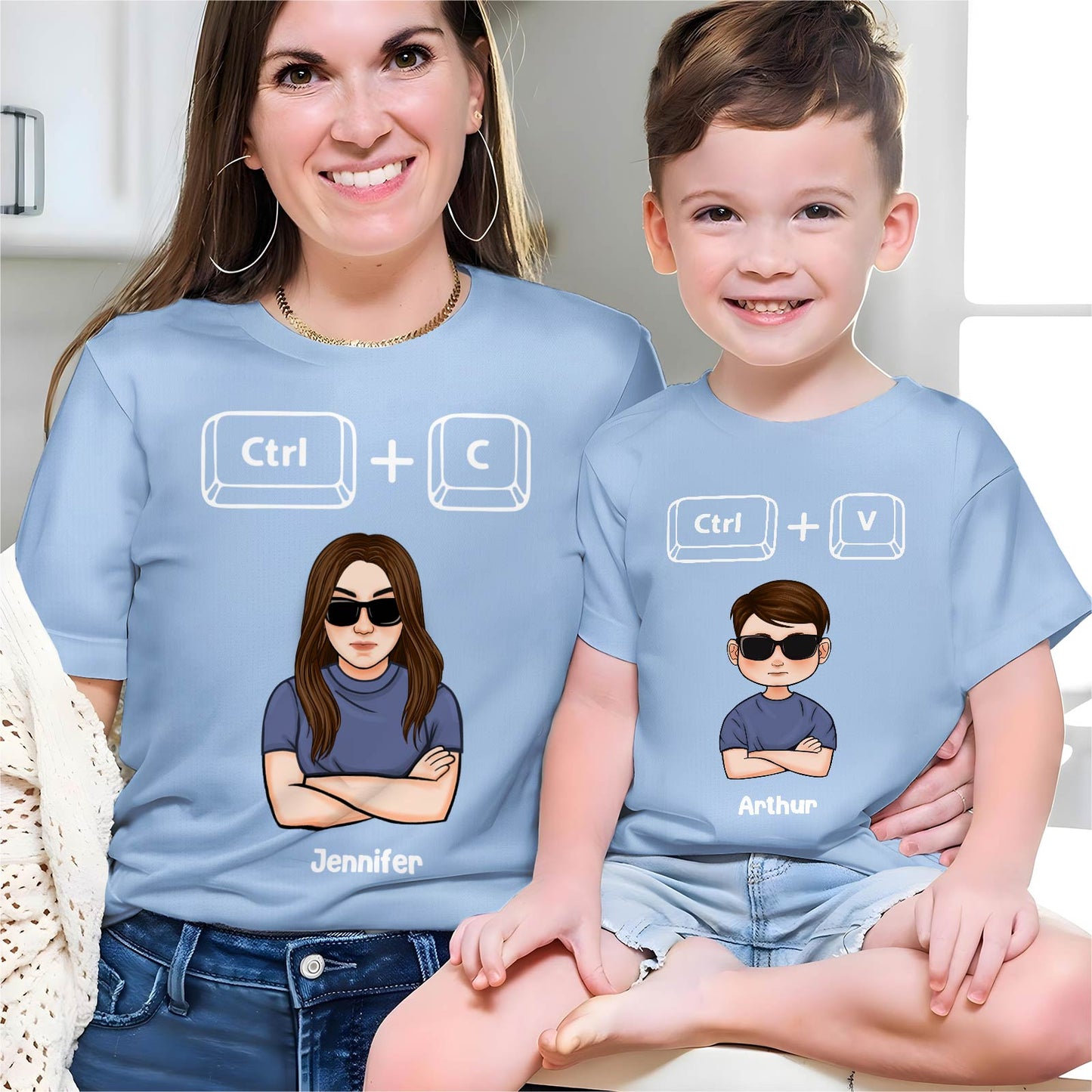 Matching copy paste shirts for dad and baby with cute cartoon designs and personalized names Jennifer and Arthur