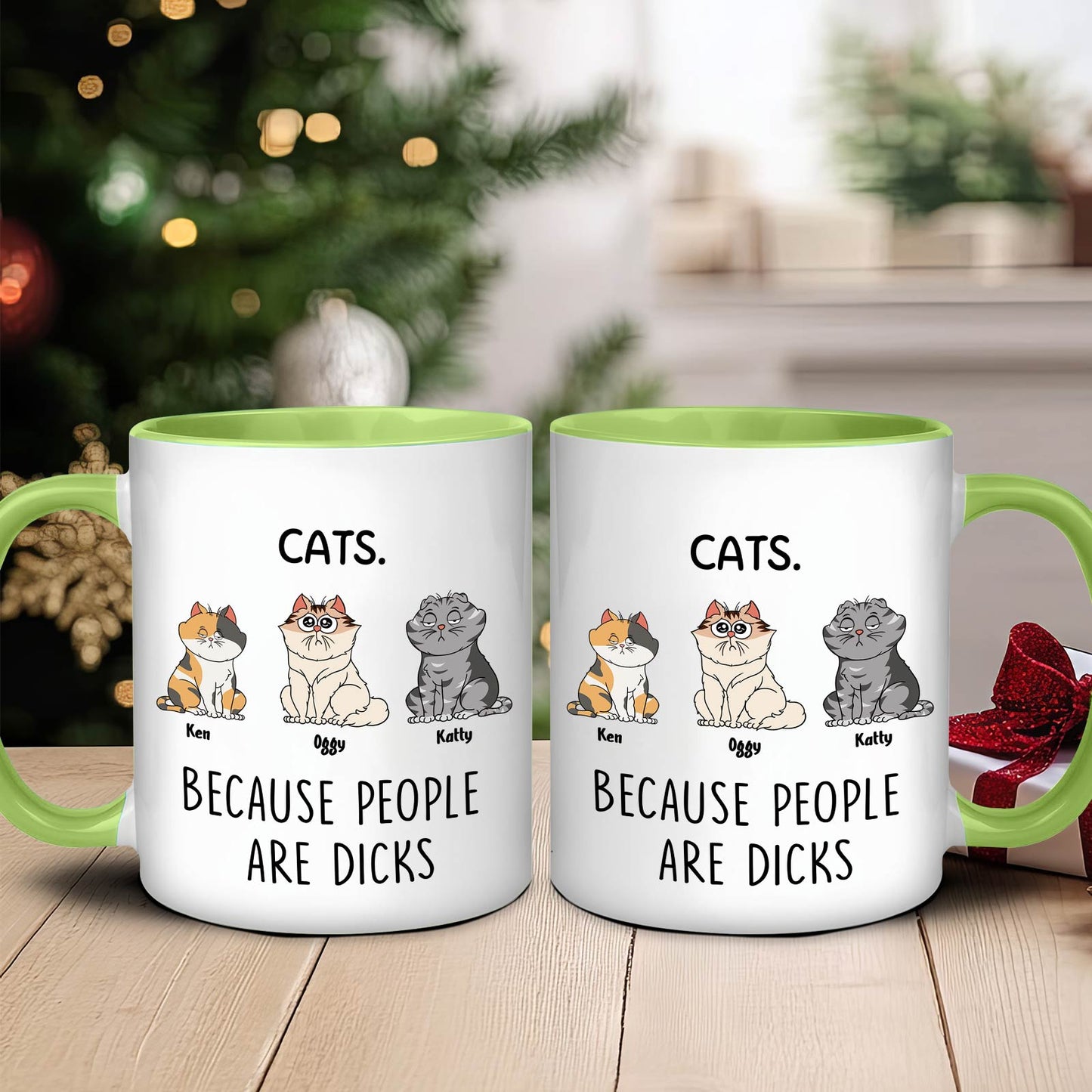 Green handled ceramic mug showing three cartoon cats and text Because People Are Dicks funny cat lover gift mug