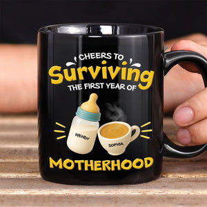 Black personalized first year of parenthood mug with bottle and coffee cup labeled Wendy and Sophia
