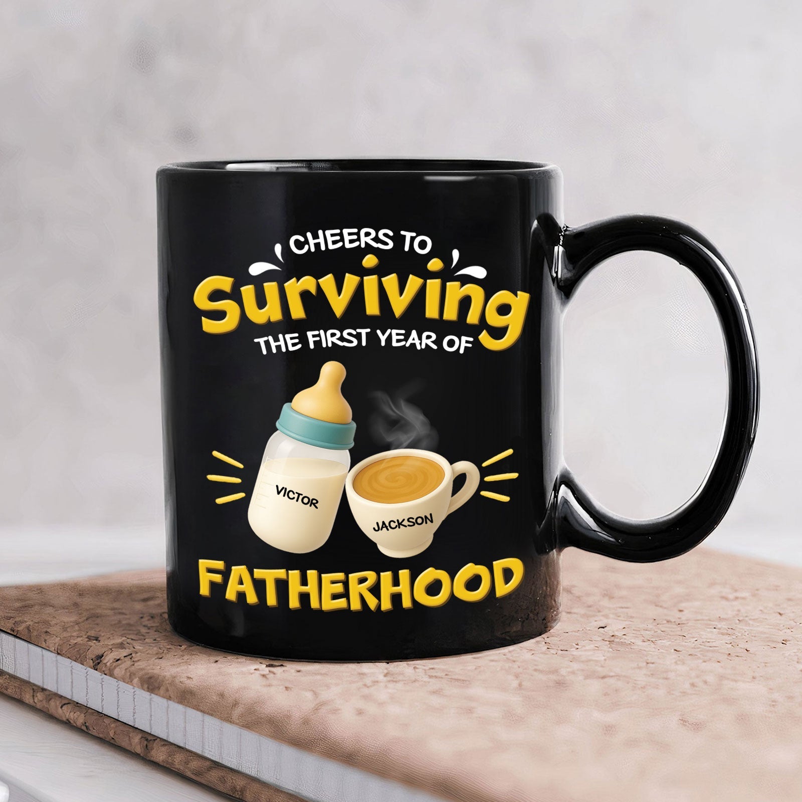 Black ceramic personalized first year of parenthood mug with Cheers to Surviving Fatherhood and bottle and cup with names