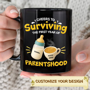 Black personalized first year of parenthood mug showing bottle and coffee cup with customizable names
