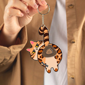 Custom acrylic cat keychain featuring a playful leopard print design with a cute character