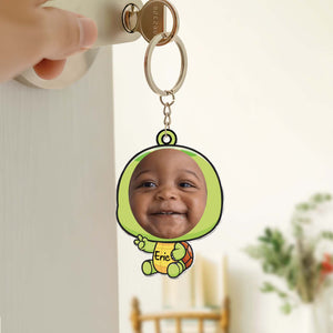 Custom acrylic photo keychain featuring a smiling baby in a colorful design