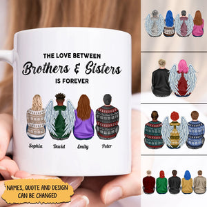 White mug featuring a custom brother and sister gift with personalized names and illustrated siblings wearing winter sweaters