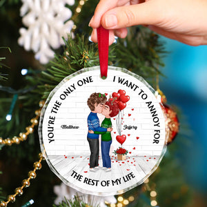 Personalized couple ornament with cartoon couple hugging and red heart balloons hanging on Christmas tree