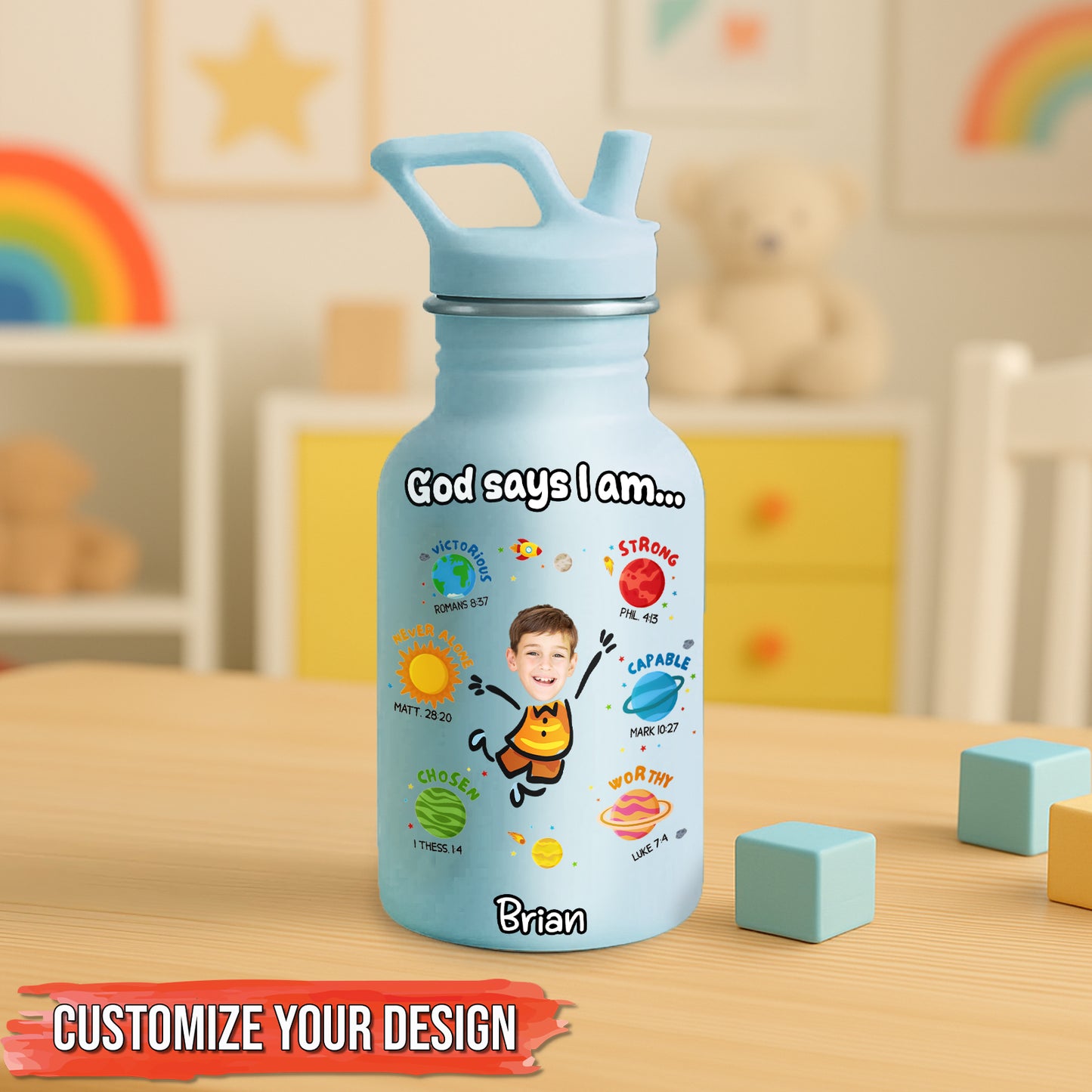 Personalized blue water bottle for kids with inspirational quotes and a photo on a wooden table
