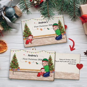 Custom wooden Christmas slider card with festive trees and child illustrations for First Christmas 2024