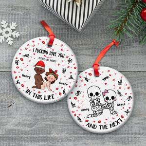 365Gifty personalized couple ornament showing two round ceramic ornaments with red ribbons and cartoon couple and skeleton designs