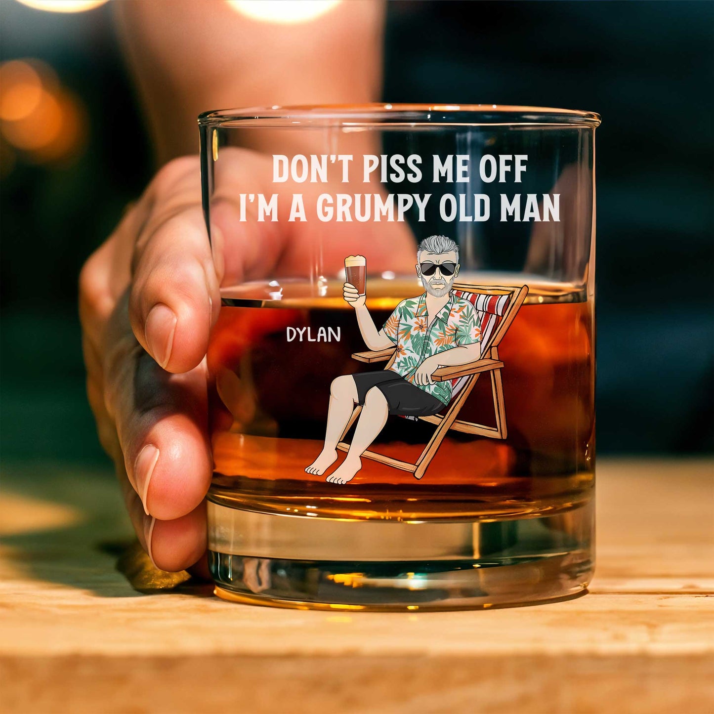 Personalized Whiskey Glass showing grumpy old man illustration with text Dont Piss Me Off and name Dylan
