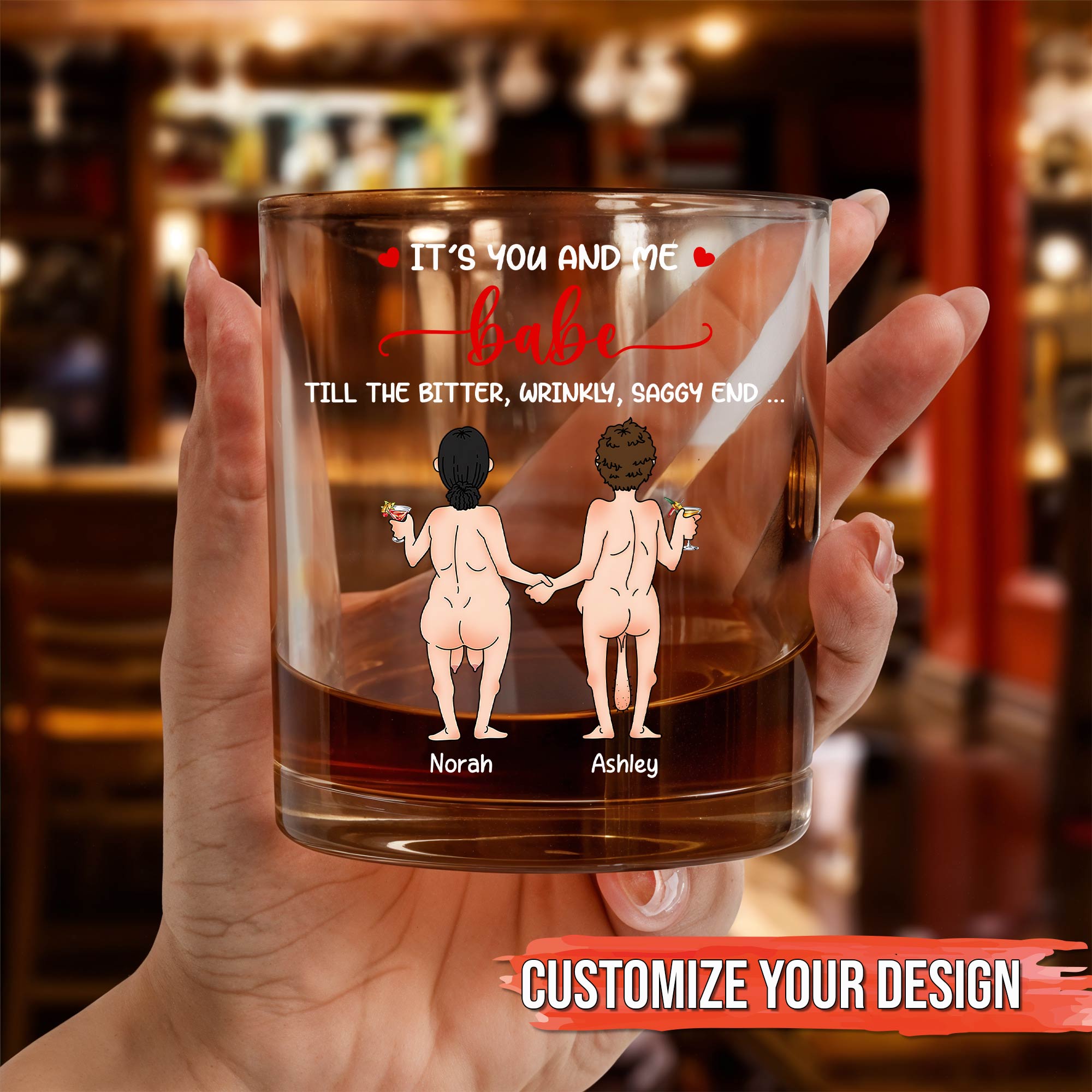 Personalized Whiskey Glass featuring customizable cartoon couple holding hands and names Norah and Ashley for anniversary gift