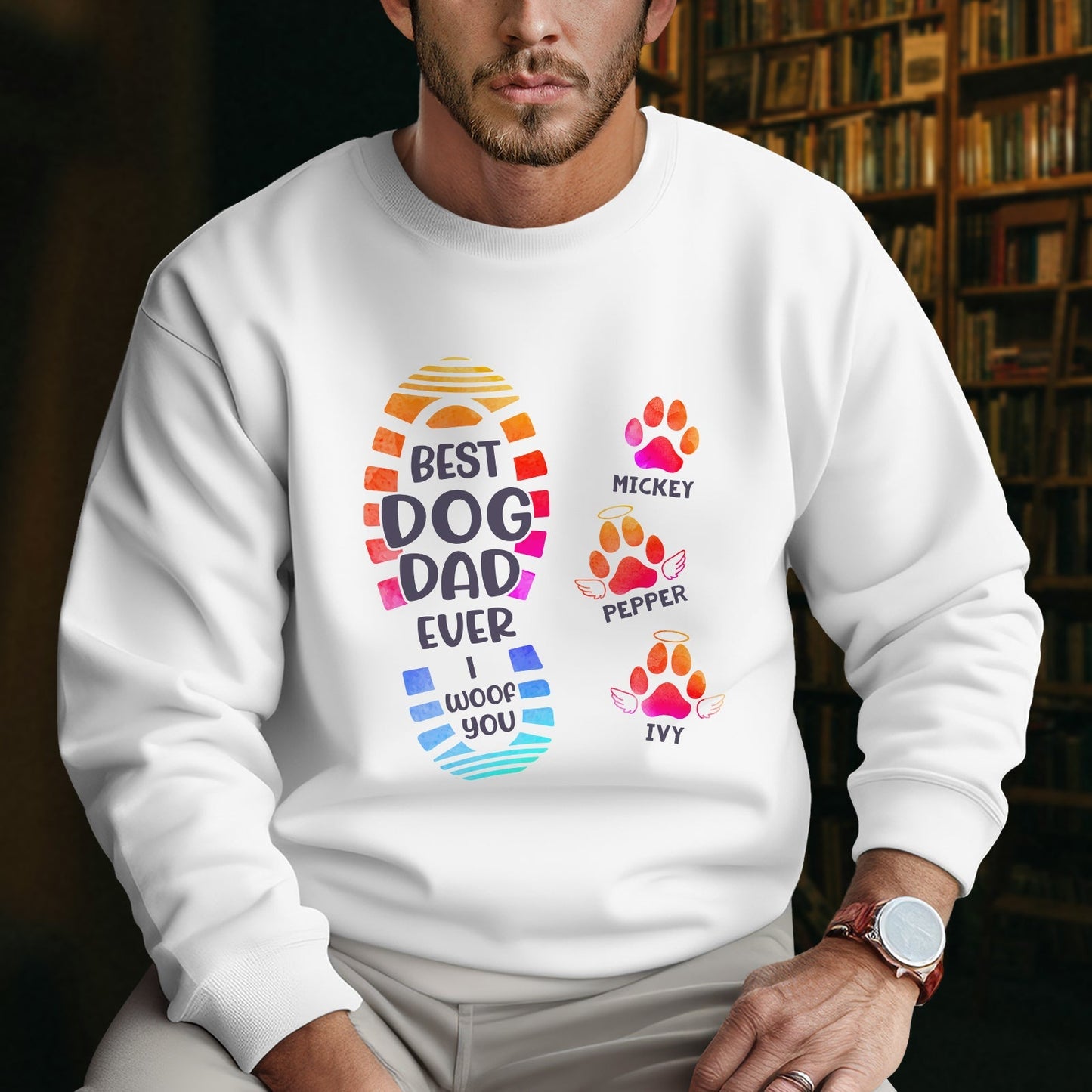 Man wearing white cat paw print personalized shirt with colorful paw prints and dog dad design