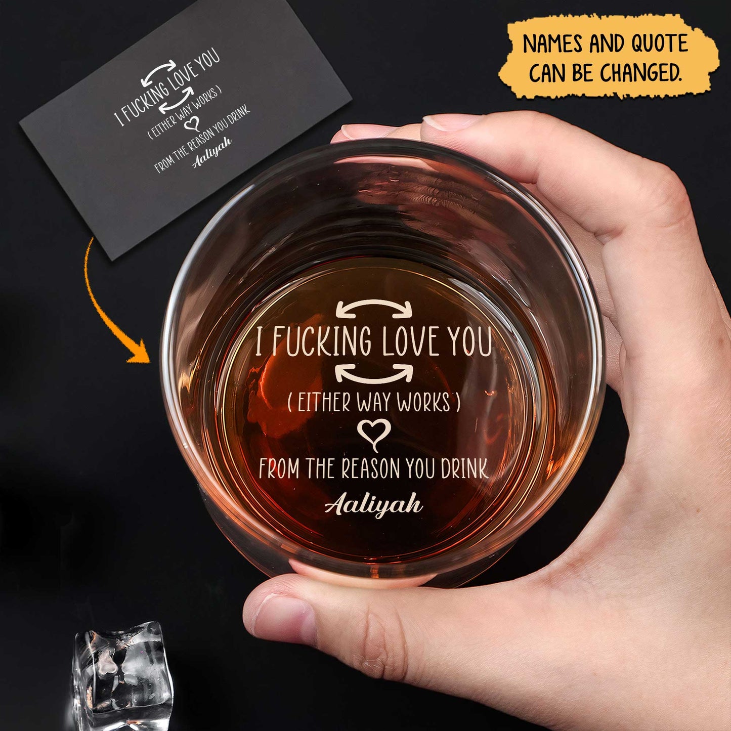 Personalized Whiskey Glass engraved with I FUCKING LOVE YOU quote shown with amber whiskey in hand