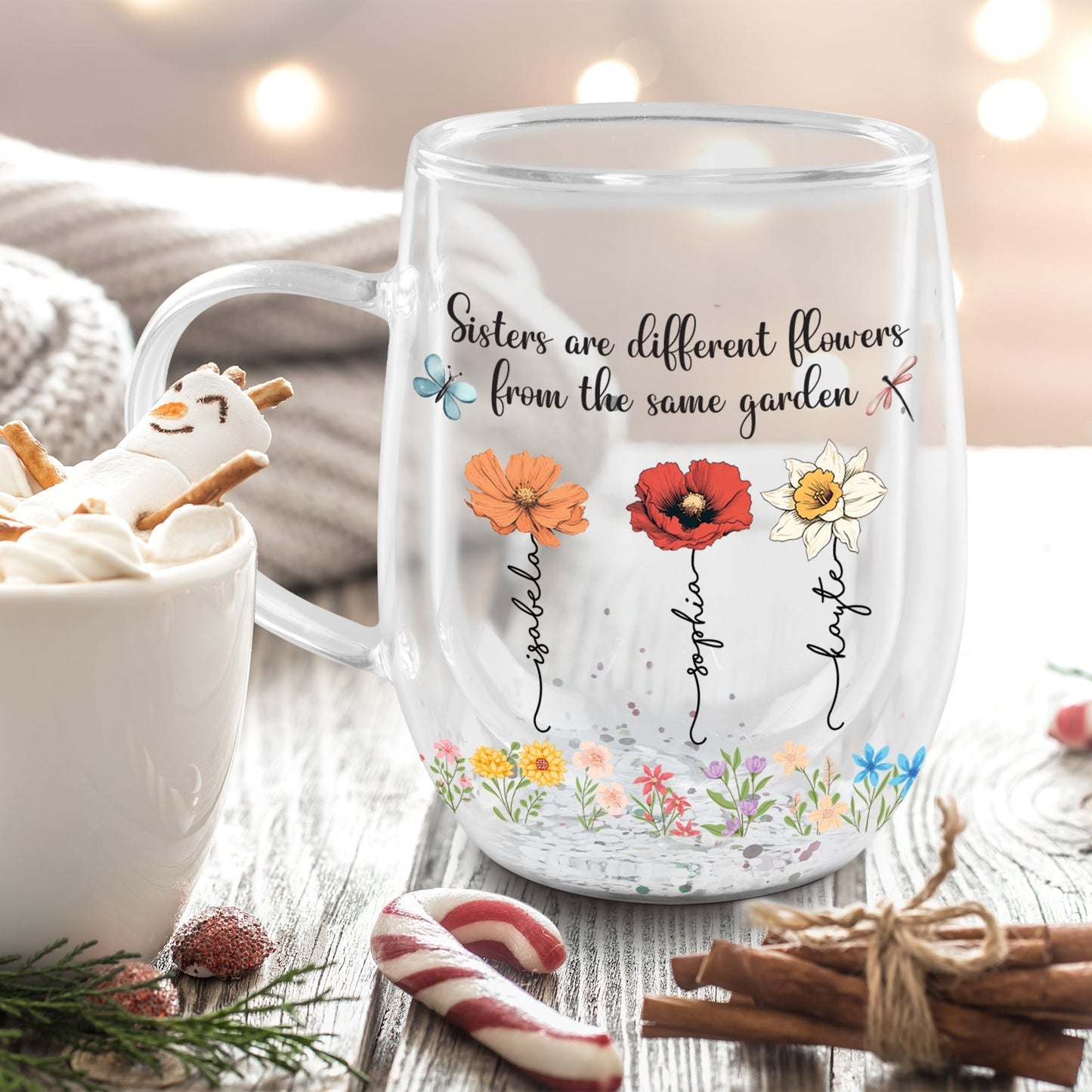 personalized bestie glass mug featuring three floral blooms and quote Sisters are different flowers from the same garden