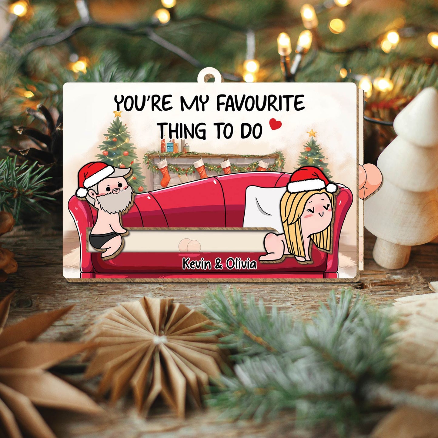 365Gifty personalized couple ornament with cartoon Santa couple on red couch and custom names