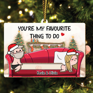 365Gifty personalized couple ornament with cartoon couple on red couch and festive Christmas background