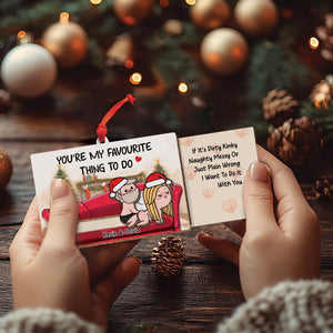 Personalized couple ornament with cute cartoon design and customizable names Kevin and Olivia hanging on Christmas tree