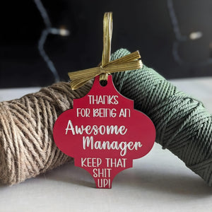 Funny Christmas wooden ornament with red design and message for an awesome manager hanging with decorative twine