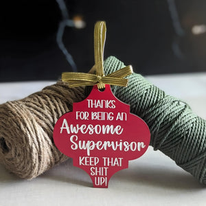 Funny Christmas wooden ornament in red with gold ribbon saying thanks for being an awesome supervisor