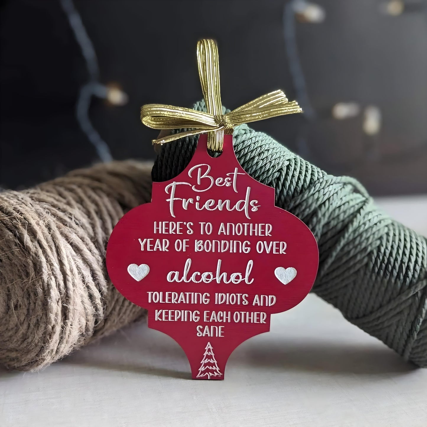 Funny Christmas wooden ornament with Best Friends quote about bonding over alcohol and tolerating idiots