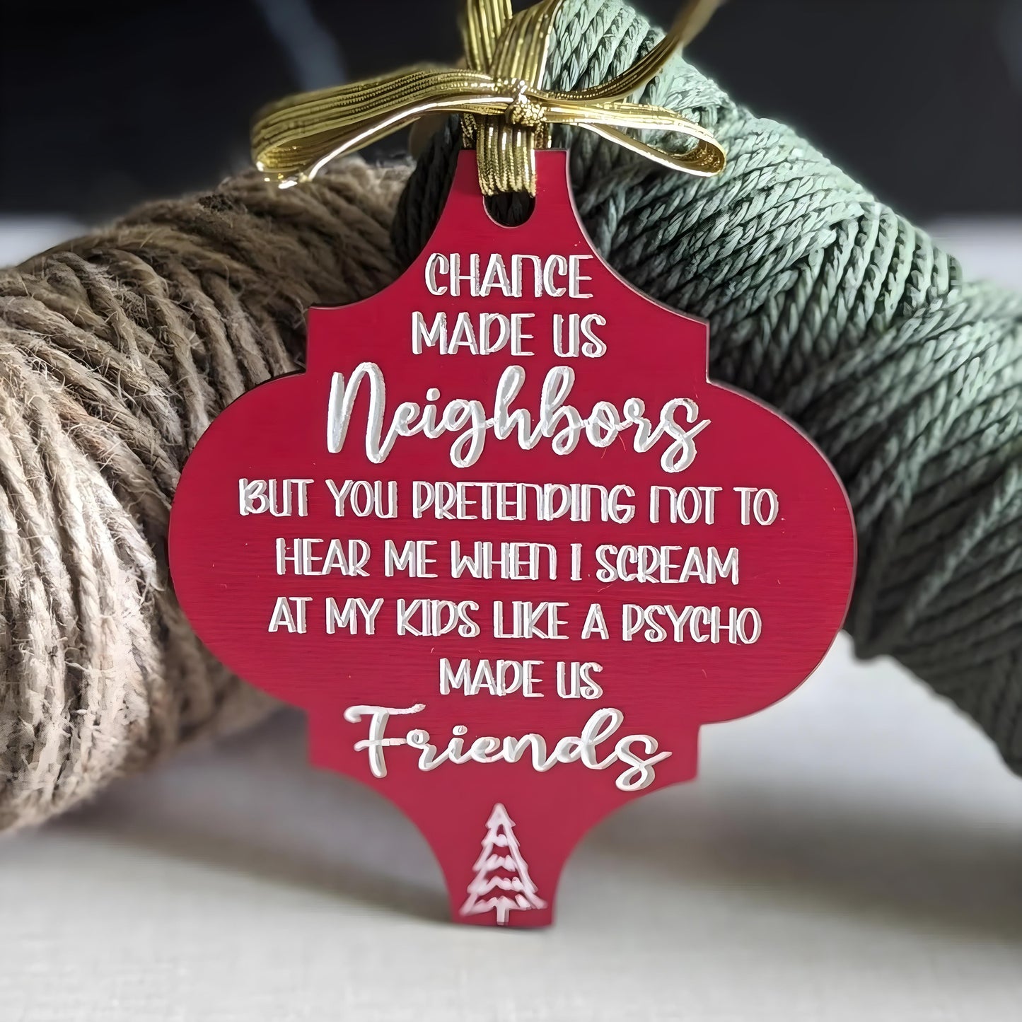 Funny Christmas wooden ornament in red with humorous neighbor message and gold ribbon hanger