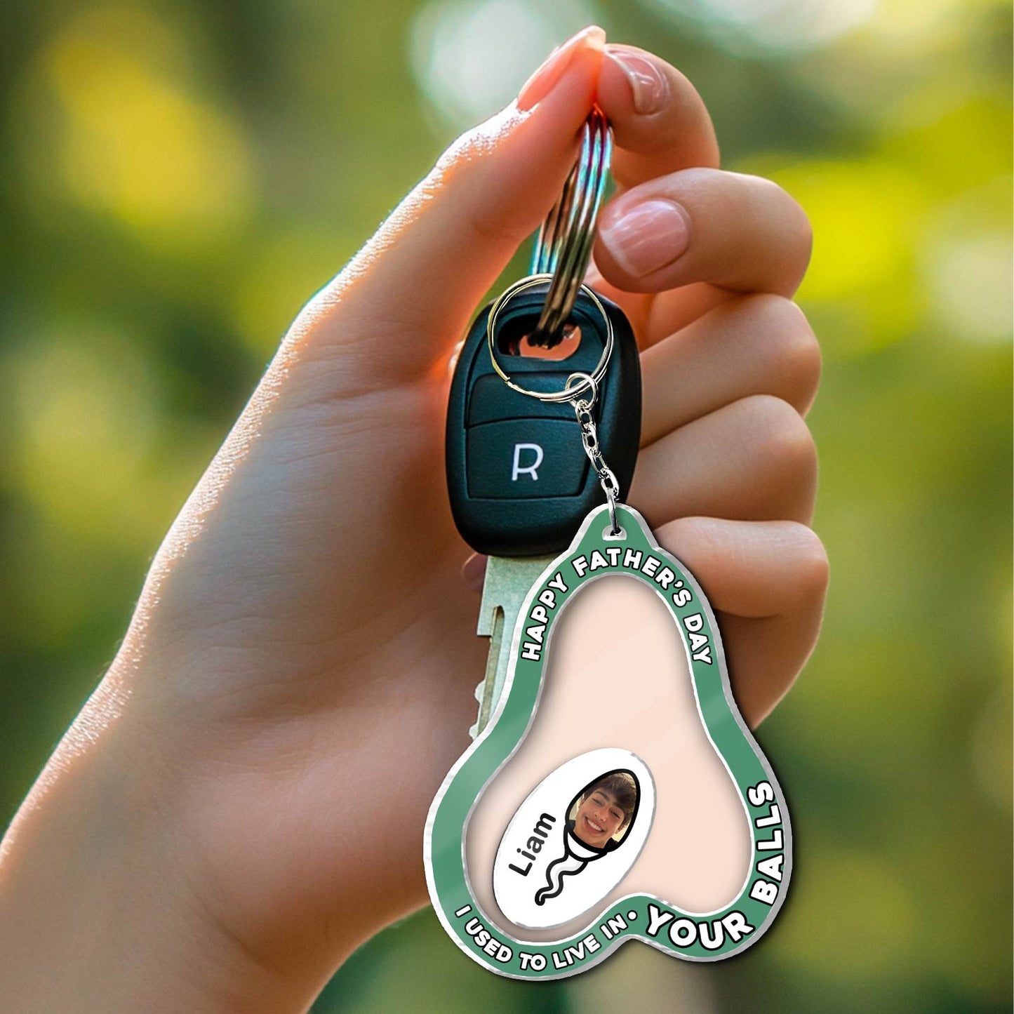 Funny personalized dad keychain featuring a humorous sperm design for Father's Day gifts
