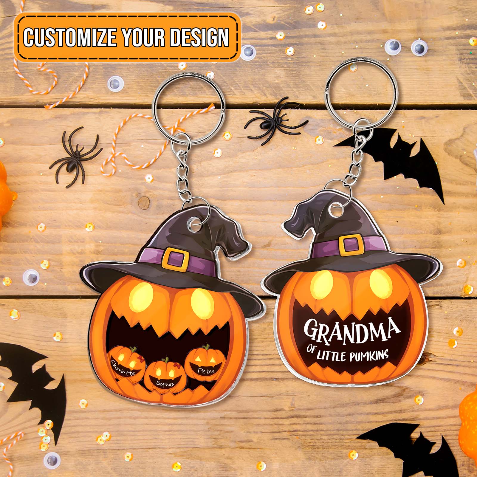 Halloween shaking pumpkin keychain with witch hat and customizable design on wooden background