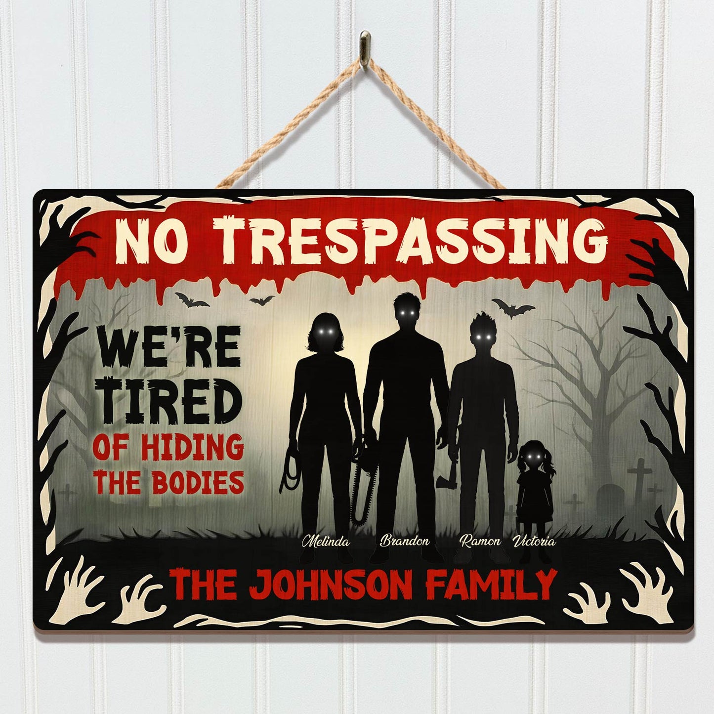 Halloween Wooden Door Sign featuring a spooky design with a family silhouette and a playful message