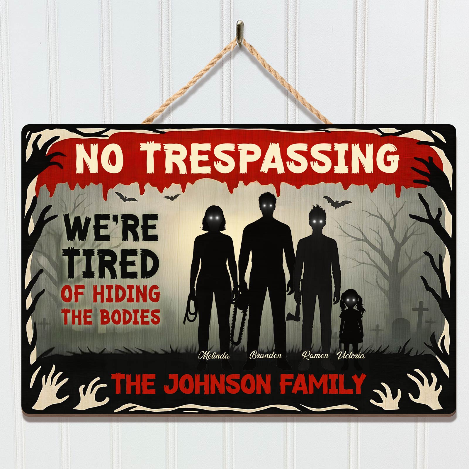 Halloween Wooden Door Sign featuring a spooky design with a family silhouette and a playful message