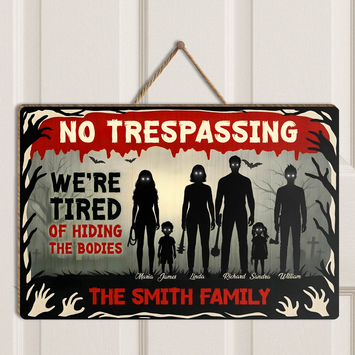 Halloween Wooden Door Sign with spooky family silhouette and humorous trespassing message