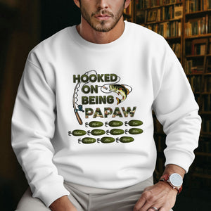 White hooked on being grandpa shirt with fishing design worn by man indoors