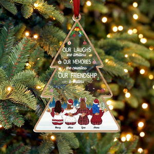 Personalized best friends ornament shaped like a Christmas tree with names and friendship quote hanging on a tree