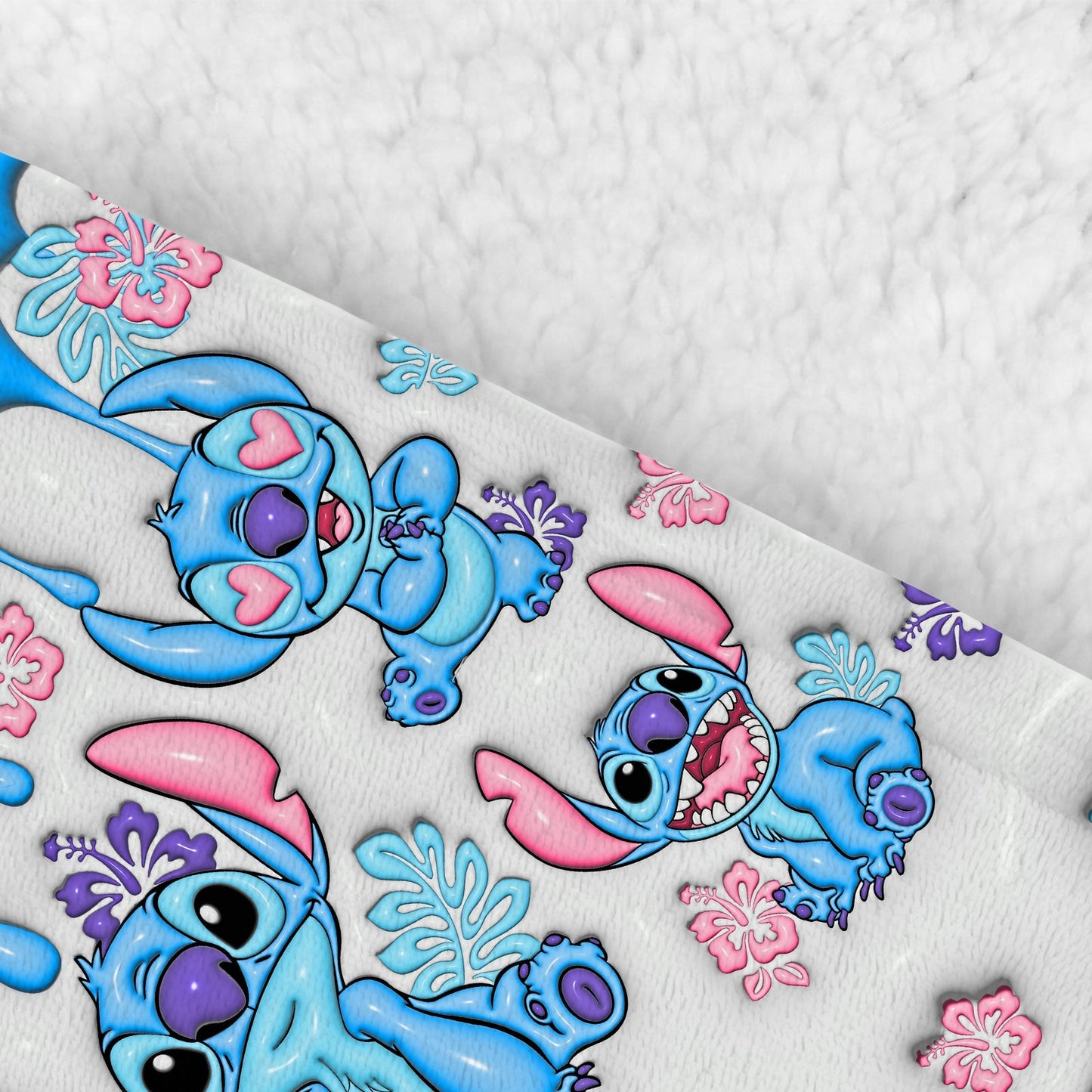 Soft ohana blanket hoodie personalized featuring blue cartoon characters and colorful floral designs