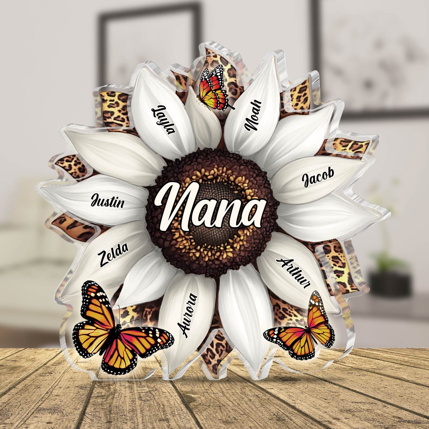 Personalized acrylic plaque for mom featuring a sunflower design with family names and butterfly accents