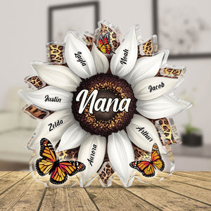 Personalized acrylic plaque for mom featuring a sunflower design with family names and butterfly accents