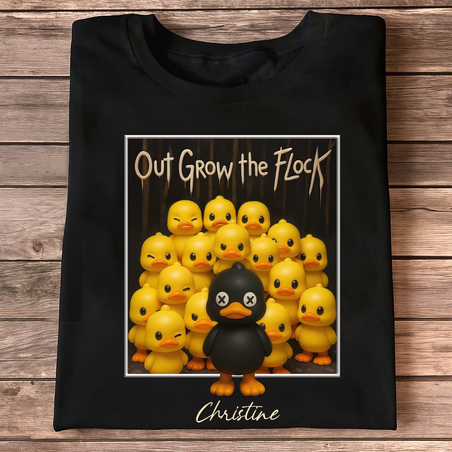 Personalized black duck shirt with cartoon yellow and black ducks and the text Out Grow the Flock