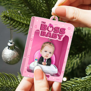 Personalized boss baby ornament featuring a cute baby in a suit on a tree branch