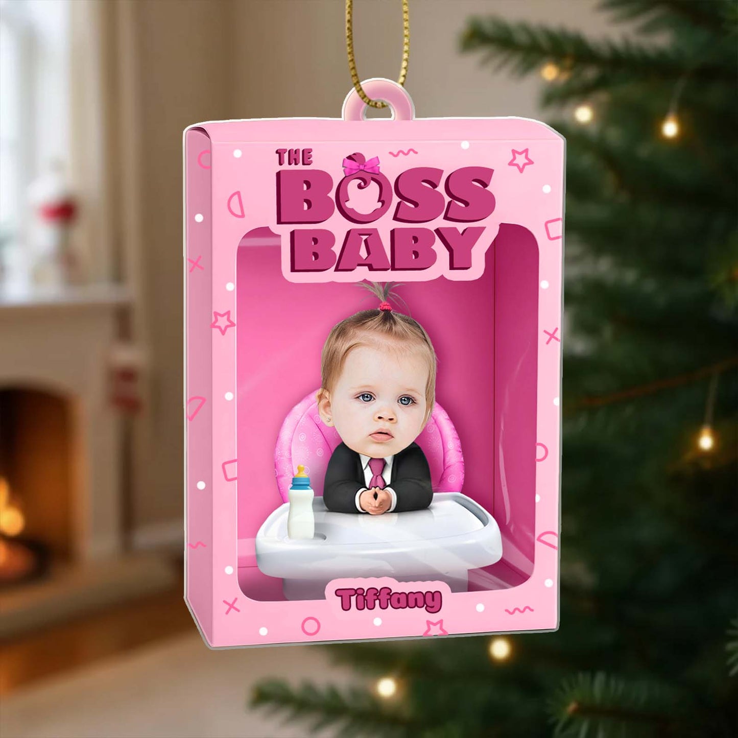 Personalized boss baby ornament in pink packaging featuring a cute baby figure in a suit