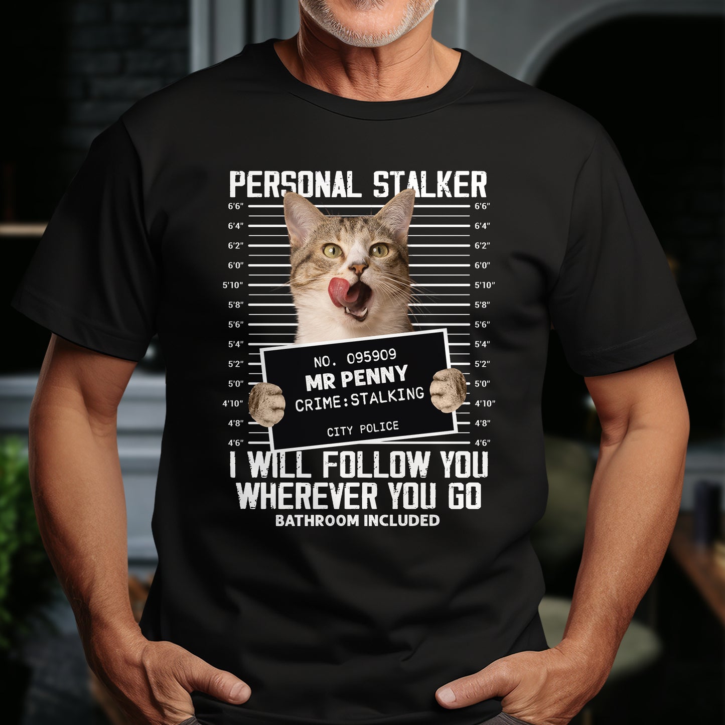 Black personalized cat lover shirt with humorous cat mugshot and stalking crime design