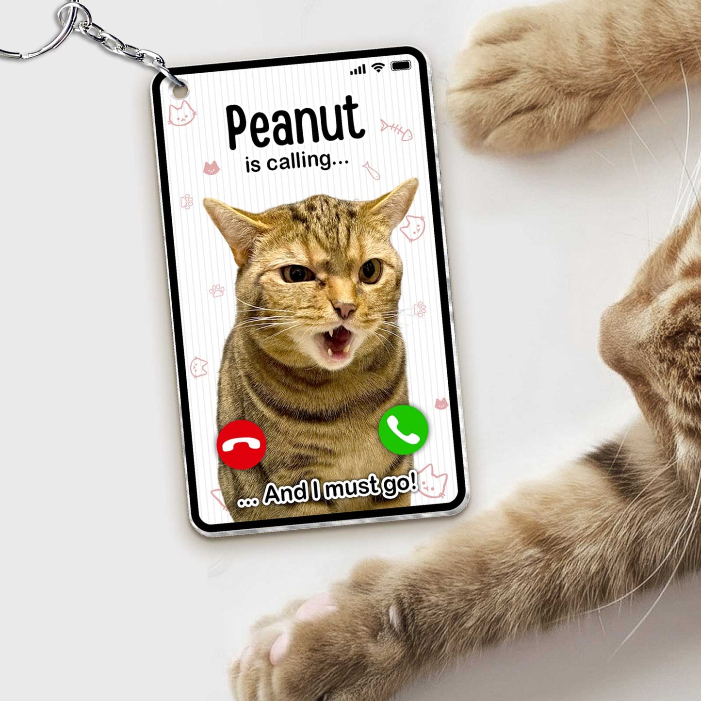 Personalized cat photo keychain featuring a festive design with Spider-Man graphics