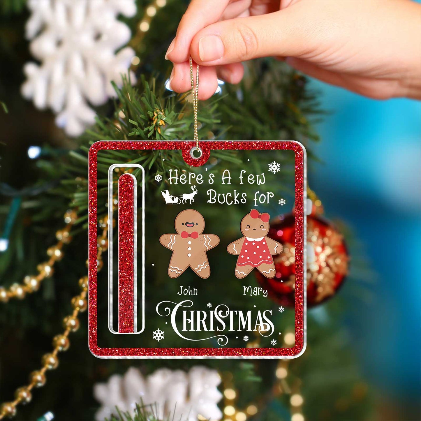 365Gifty personalized Christmas money holder ornament with gingerbread figures and glitter border hanging on tree