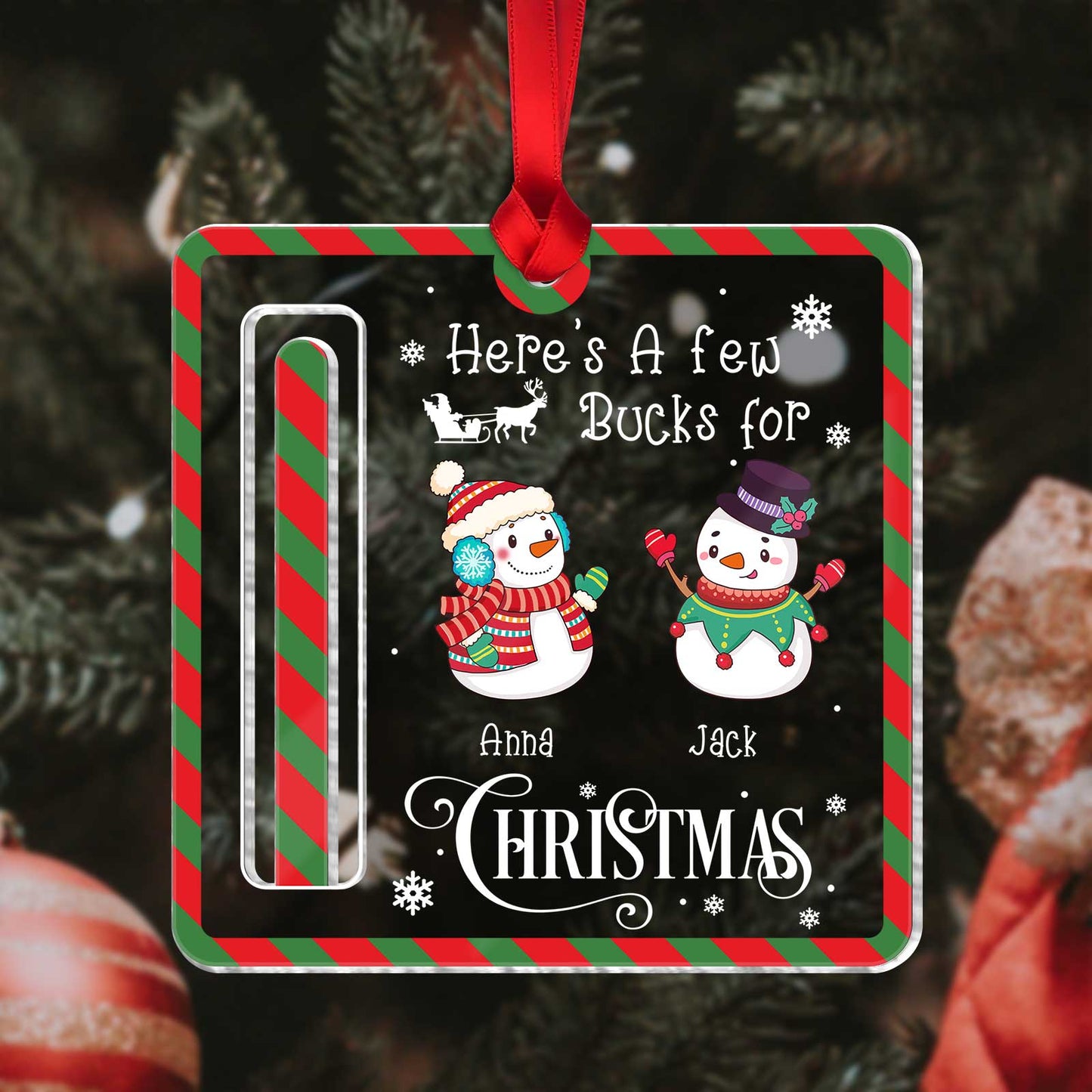 Personalized Christmas money holder with cute snowmen and red green striped border hanging on tree