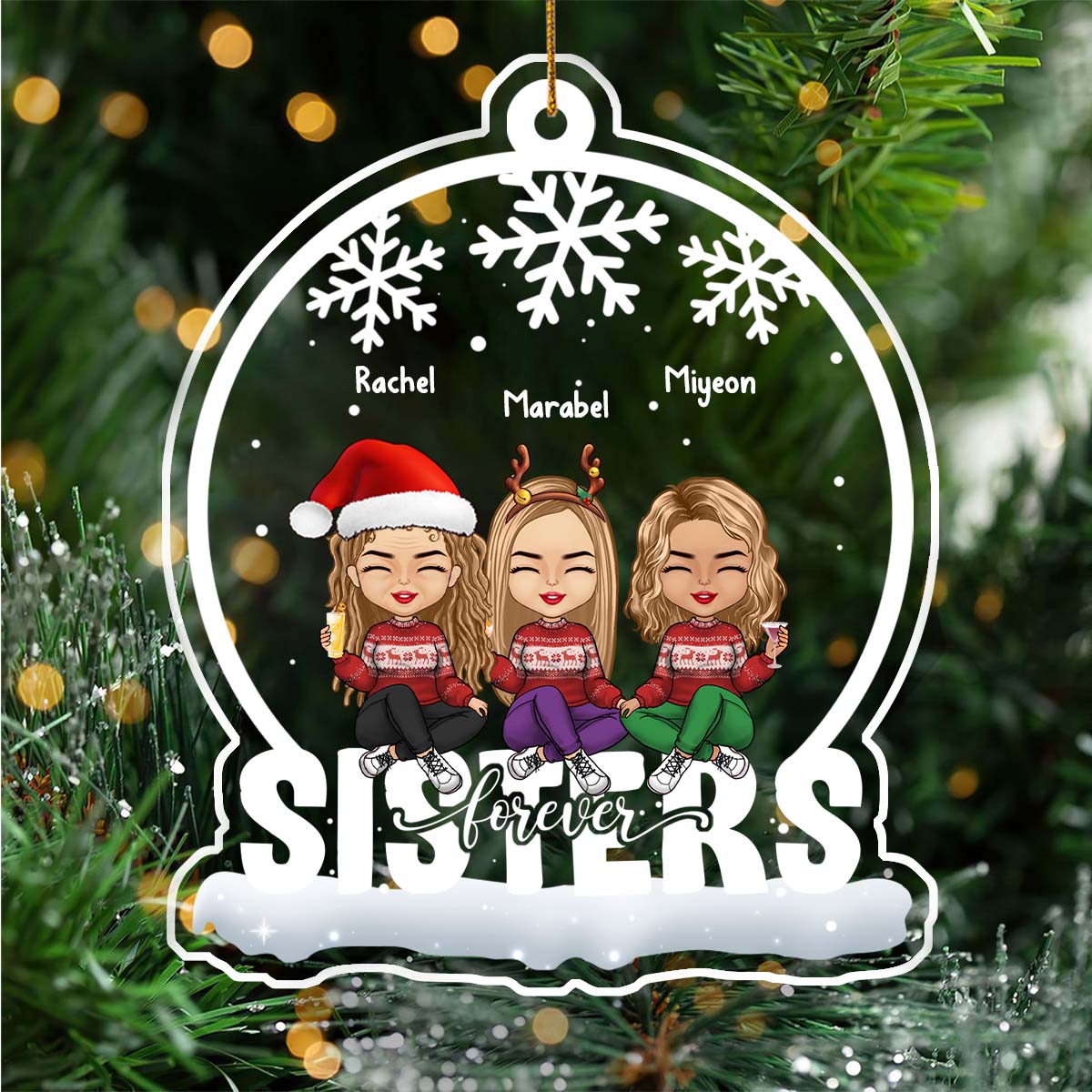 Personalized Christmas ornament with three cartoon sisters wearing holiday outfits and snowflakes design
